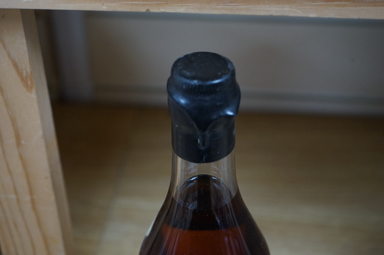 A bottle of Les Comtes De Cadignan Bas Armagnac. Condition - fair, from a local private cellar